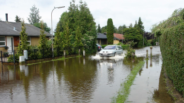 Oversvømmet villavej